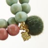 Mala Armband zweifach auf Elastikband mit Perlen aus vergoldeten 925 Sterlingsilber, verschiedenfarbigem Holz und Pompom