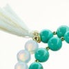 Mala Armband zweifach auf Elastikband mit Perlen aus vergoldetem 925 Sterlingsilber, Türkis, Opal und Quaste